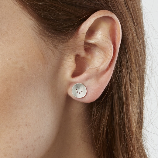 Round silver earrings  with patterning