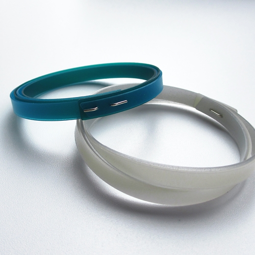 two bangles showing thin blue and green bangle