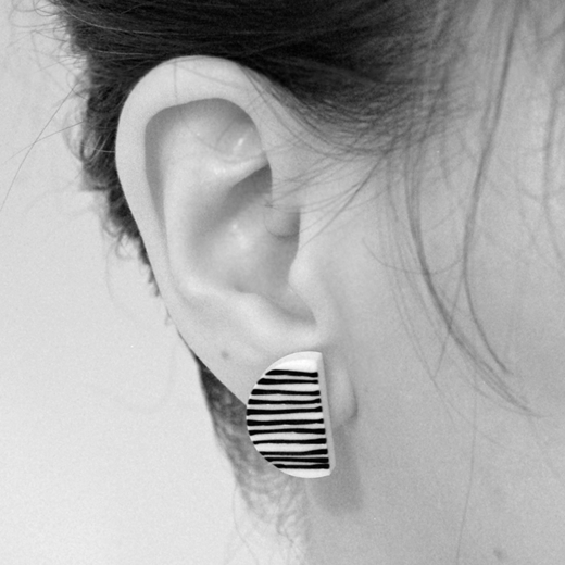 line up earrings on model