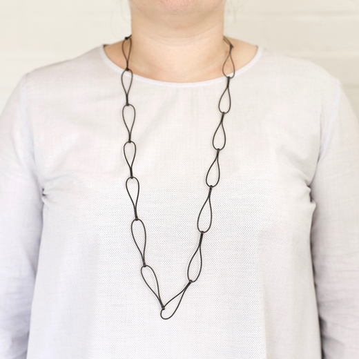 Oxidised silver loop necklace worn
