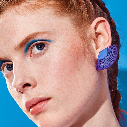 Helio earrings on model