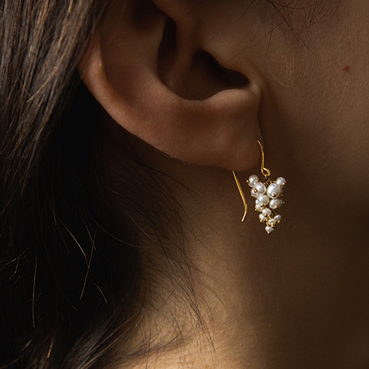 grape earrings on model