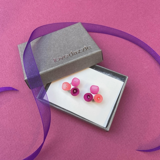 Pink fade studs - lovedazzle box