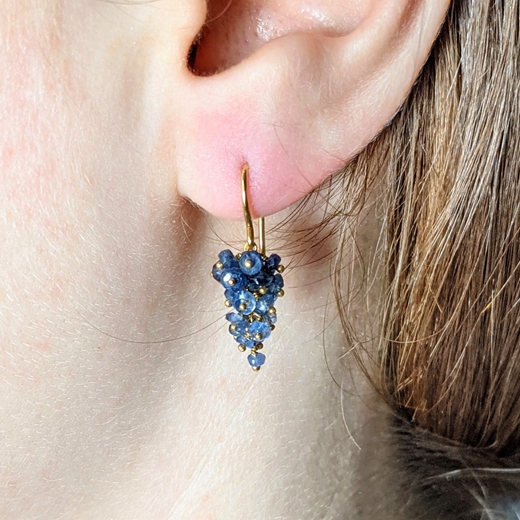 Sapphire grape earrings on model