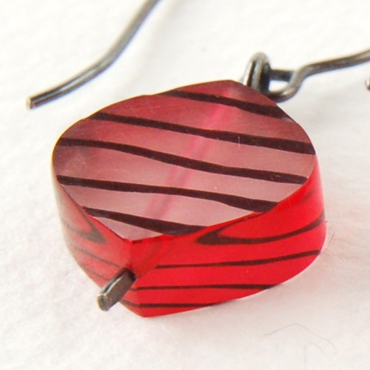red leaf earrings detail