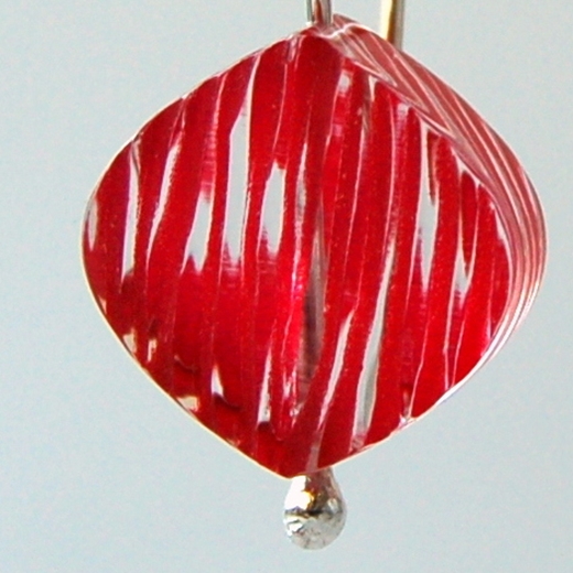 red petal earrings detail