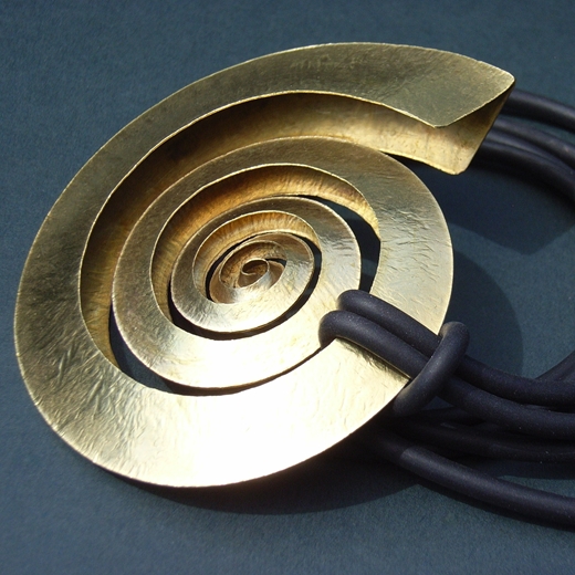Large brass swirl pendant