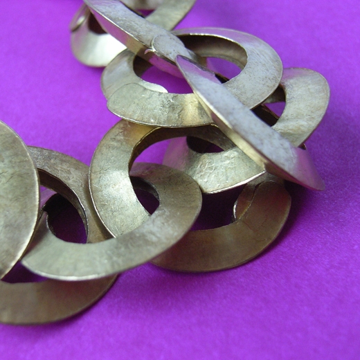 Close-up small brass link chain