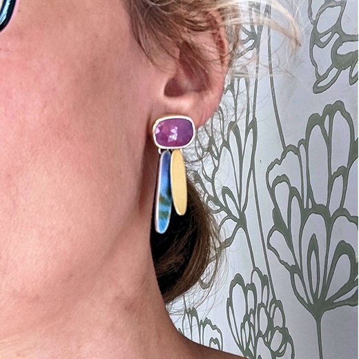 pink sapphire earring worn