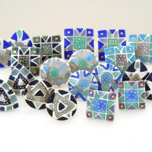 Selection of etched and enamelled earrings