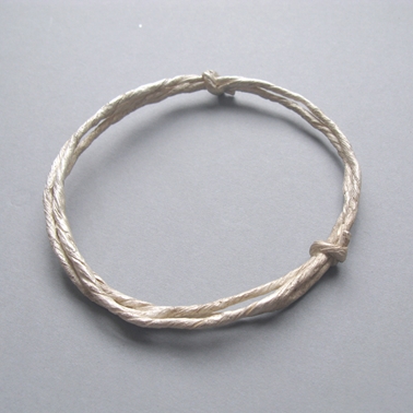 string bangle with double knot