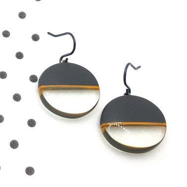round charcoal resin drop earrings with orange stripe
