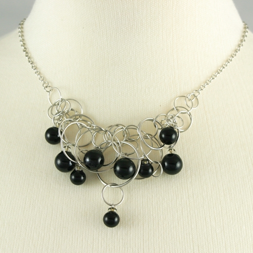 Solid Black 9 Bubble Necklace on model