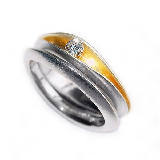 split silver shell ring with 10pt diamond
