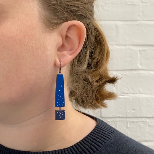 two_blue_earrings_worn