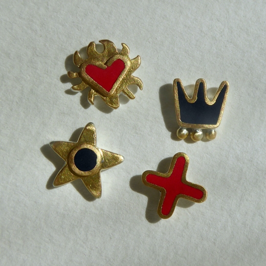 Set of 4 studs (flaming heart, kiss, star, crown)